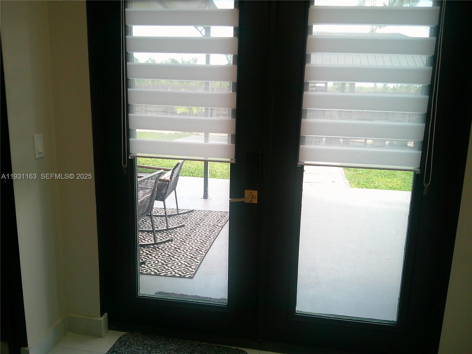 26831 Southwest 119th Court Homestead, FL 33032 - Photo 26 of 27 a view of an front door