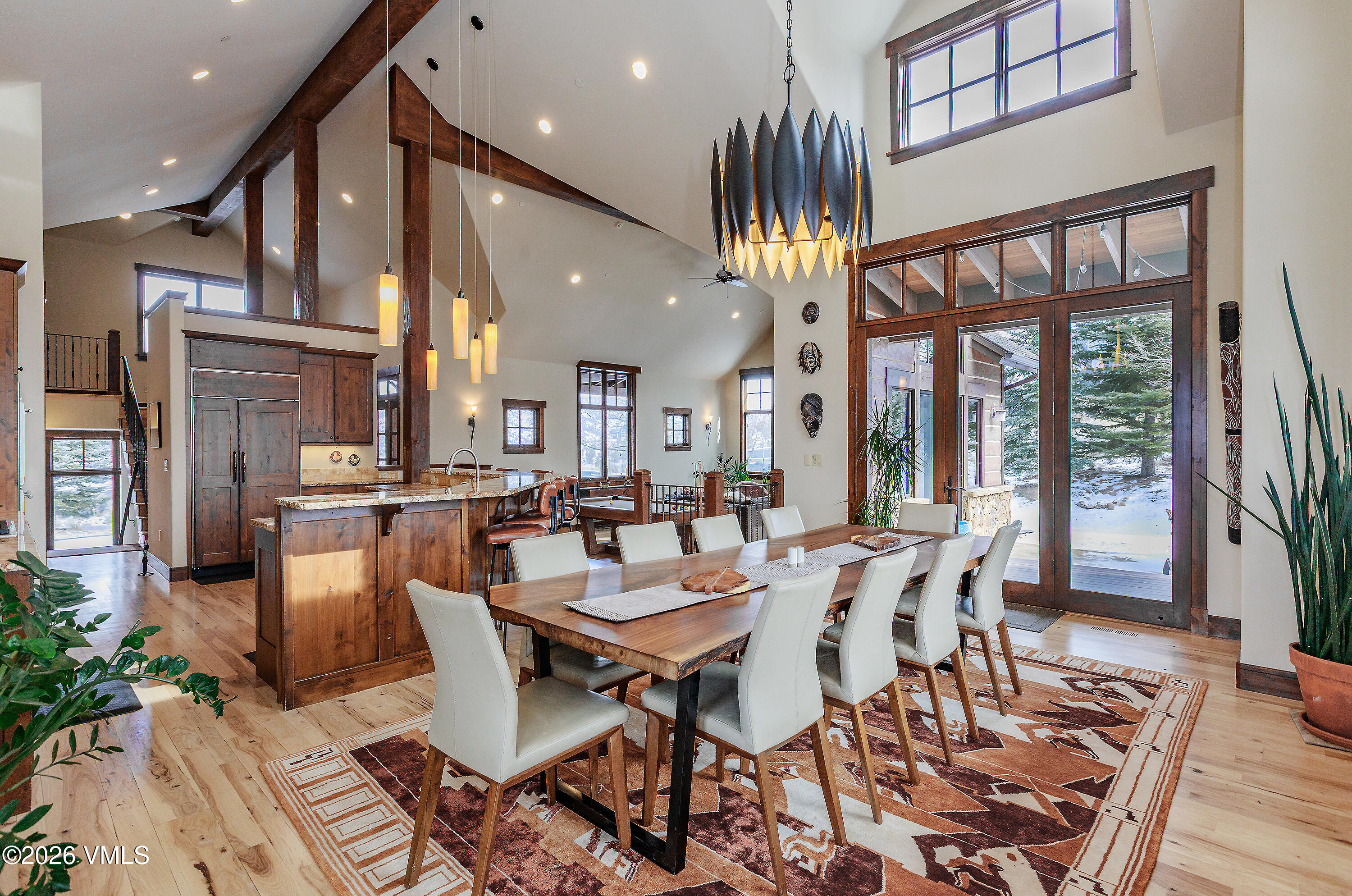 2753 East Haystacker Drive Eagle, CO 81631 - Photo 14 of 41 a view of a dining room with furniture window and wooden floor