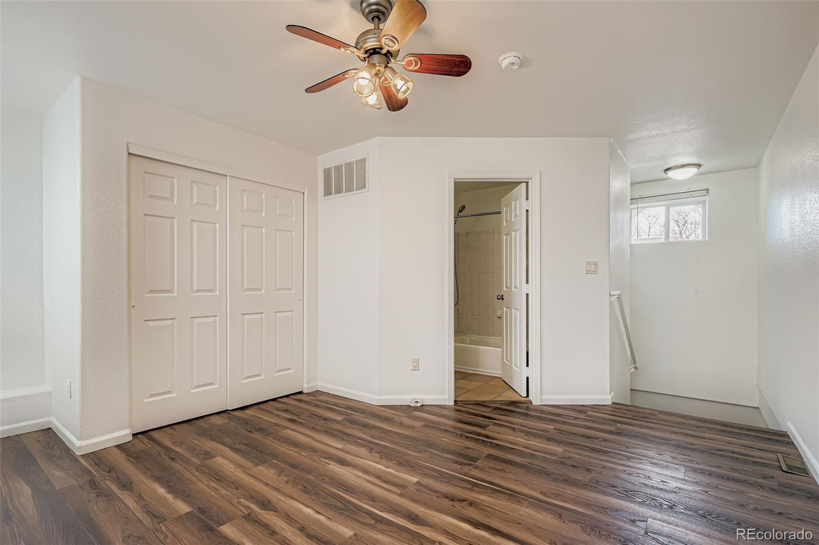 714 East 18th Avenue Denver, CO 80203 - Photo 16 of 20 a view of empty room with wooden floor