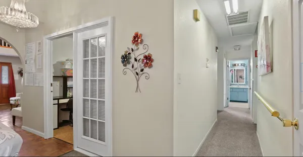a view of a hallway with interior of the house