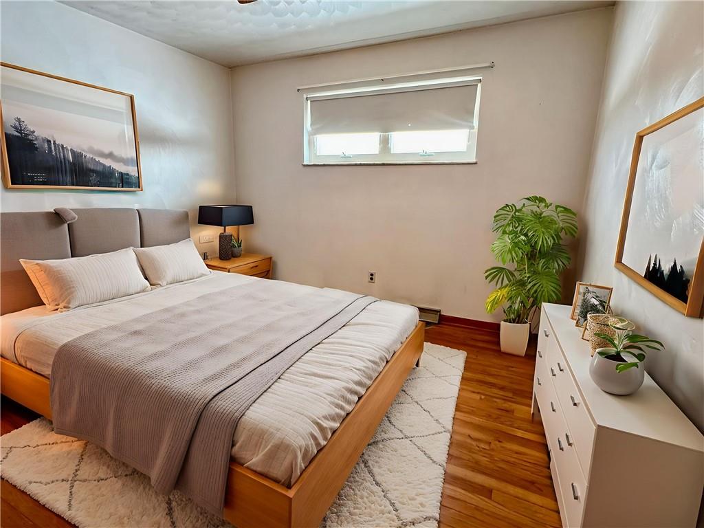 260 Simon Drive Butler, PA 16002 - Photo 18 of 46 a bedroom with bed and a couch