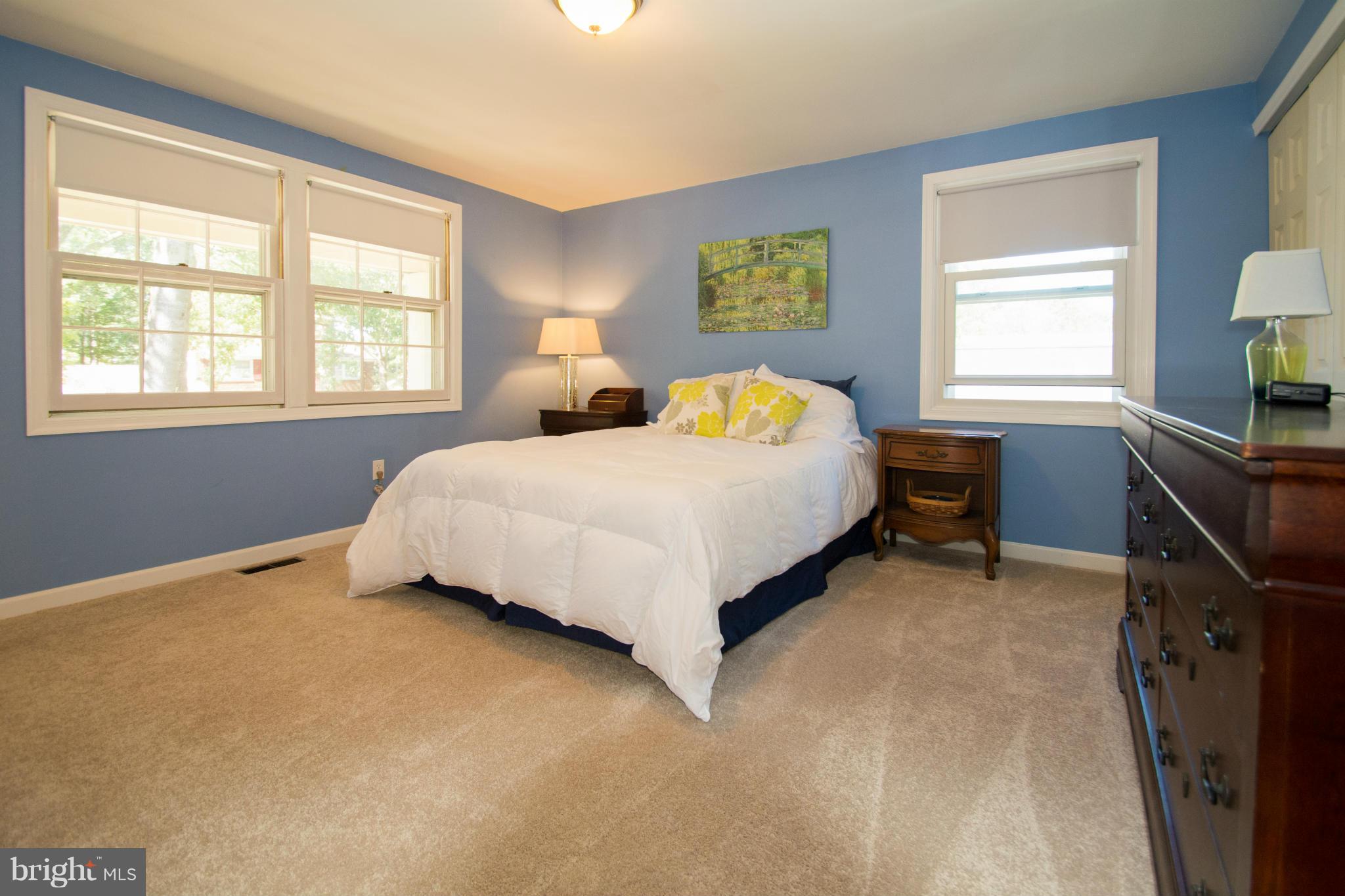 1712 Tarleton Way Crofton, MD 21114 - Photo 12 of 26 a bed sitting in a bedroom next to a window