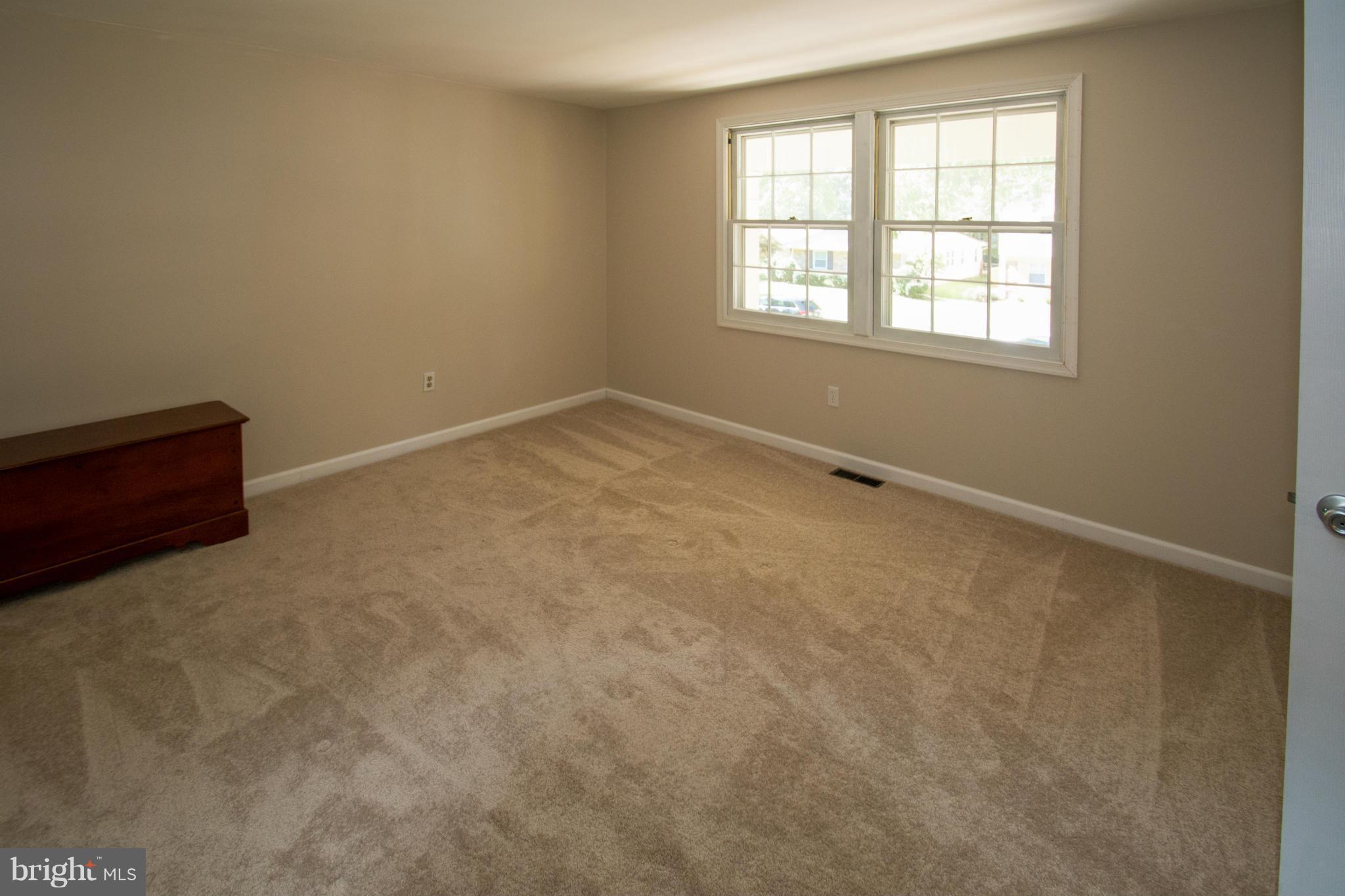 1712 Tarleton Way Crofton, MD 21114 - Photo 18 of 26 an empty room with a window