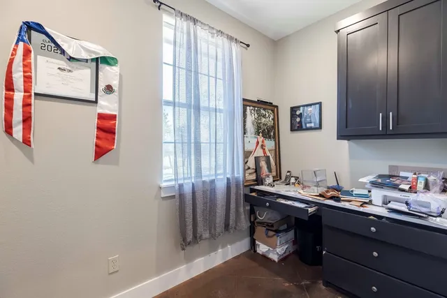 a room with furniture and window