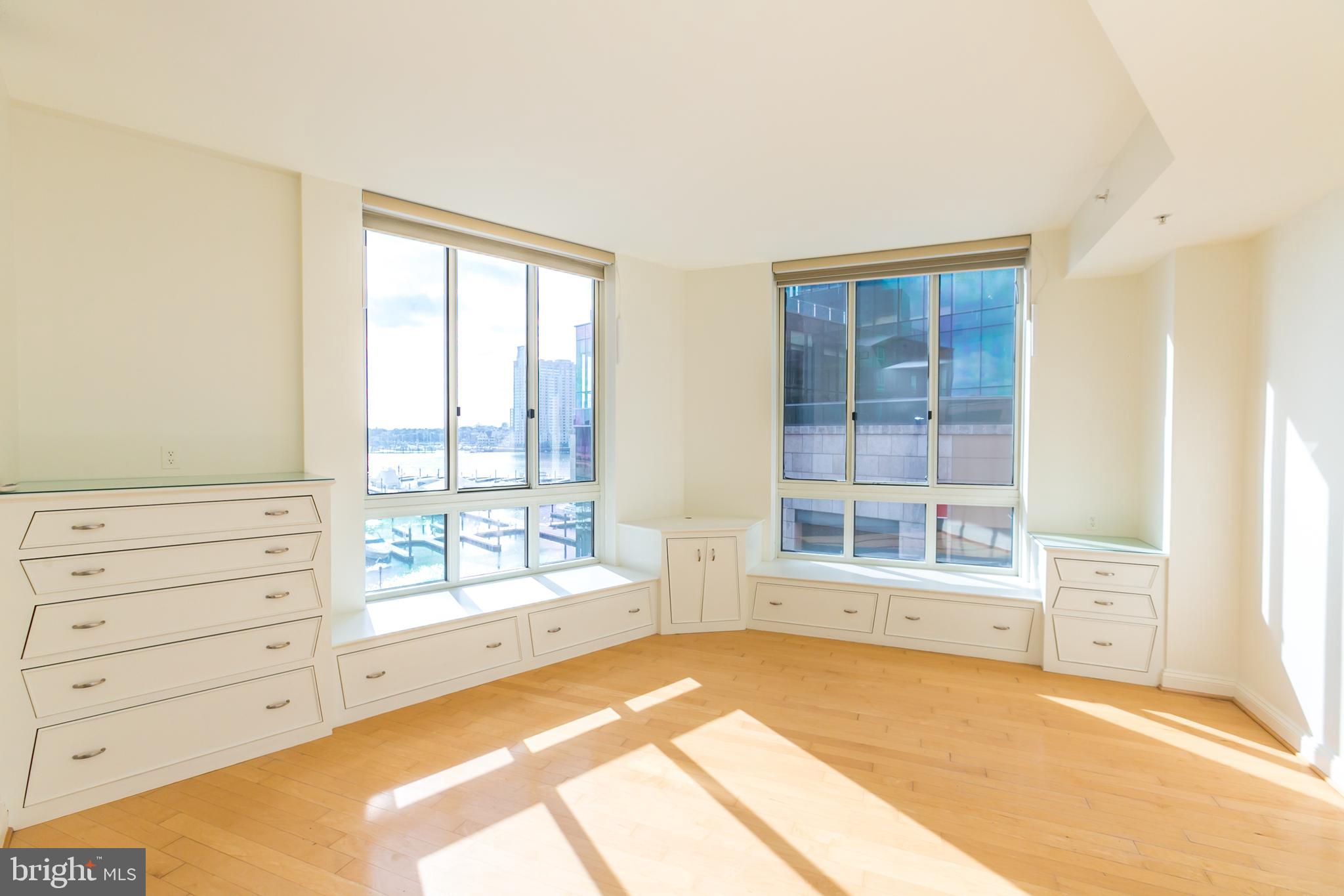 717 President Street, Unit 401 Baltimore, MD 21202 - Photo 14 of 36 a view of room with window and cabinet