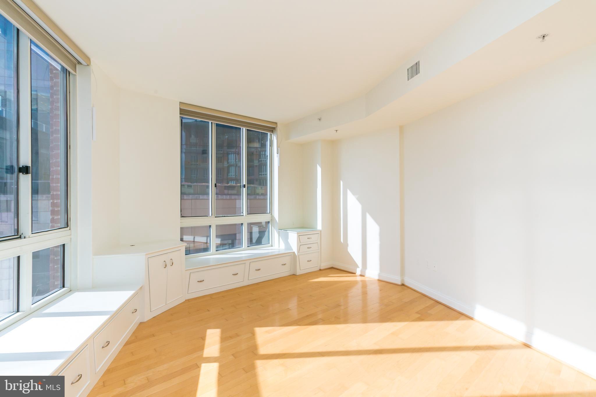 717 President Street, Unit 401 Baltimore, MD 21202 - Photo 15 of 36 a view of a room with large windows