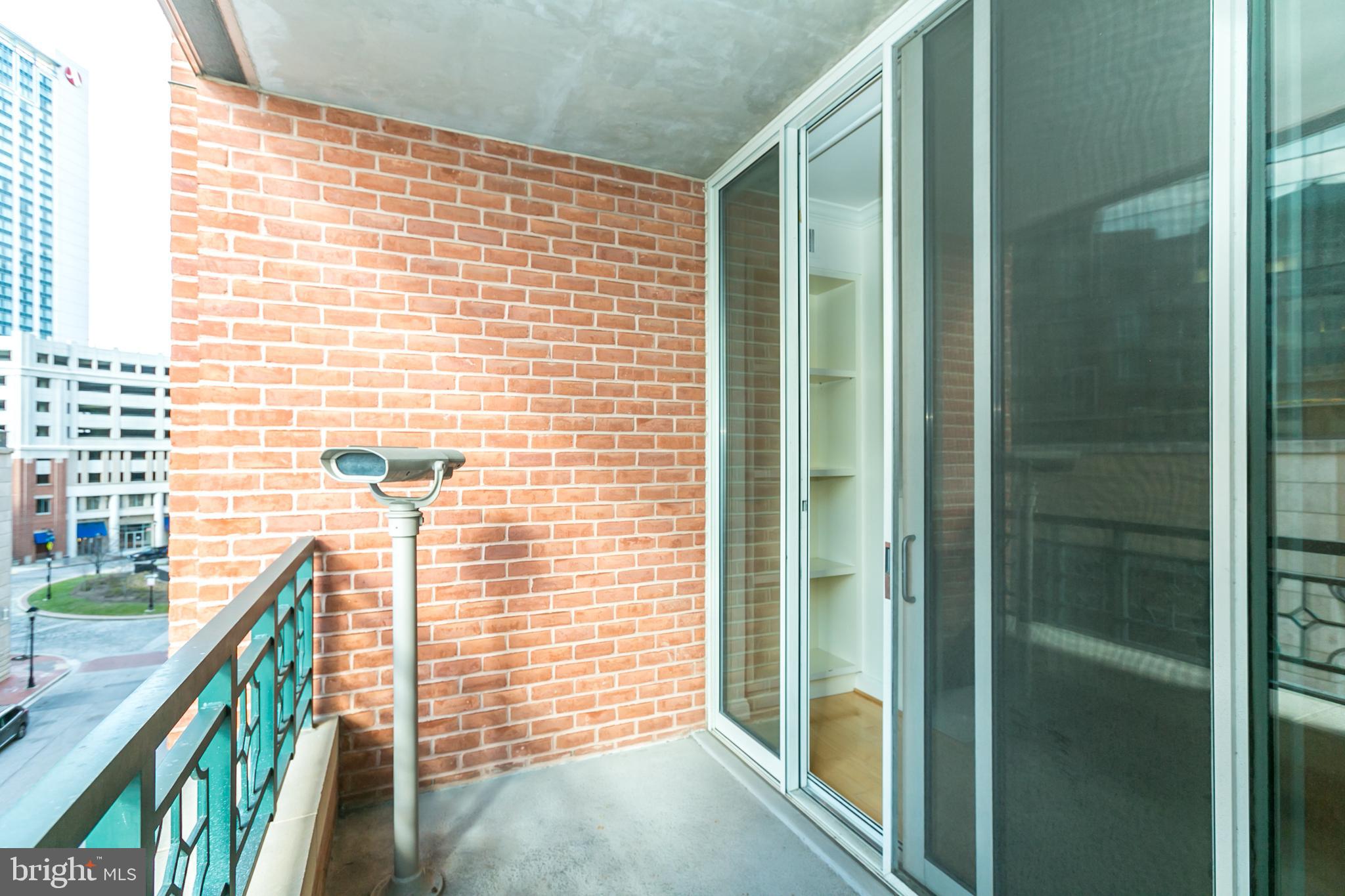 717 President Street, Unit 401 Baltimore, MD 21202 - Photo 33 of 36 a view of balcony with wooden floor