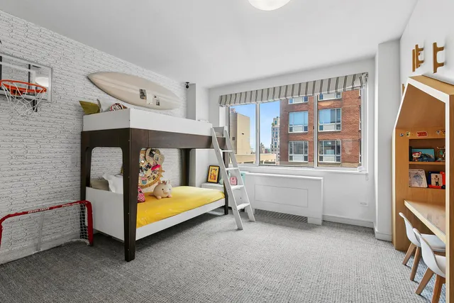 a view of a terrace with chairs and potted plants