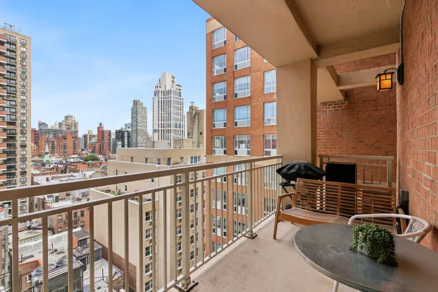 a bedroom with furniture and a wooden floor