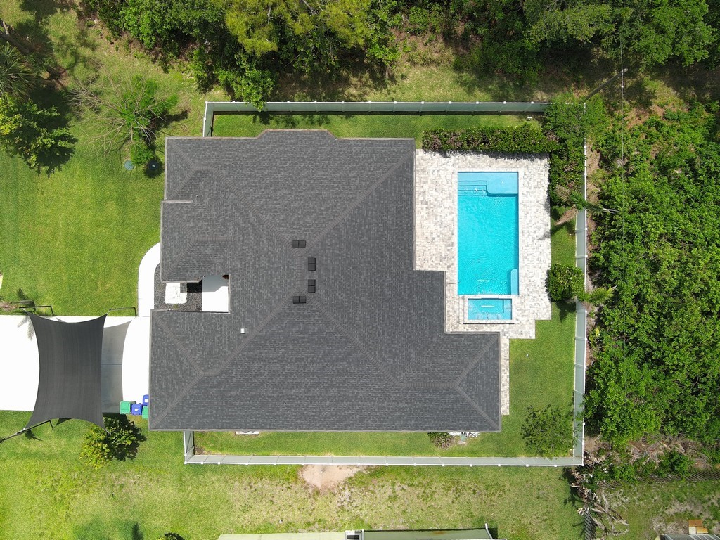 431 Midvale Terrace Sebastian, FL 32958 - Photo 33 of 34 an aerial view of a house with a yard basket ball court and outdoor seating