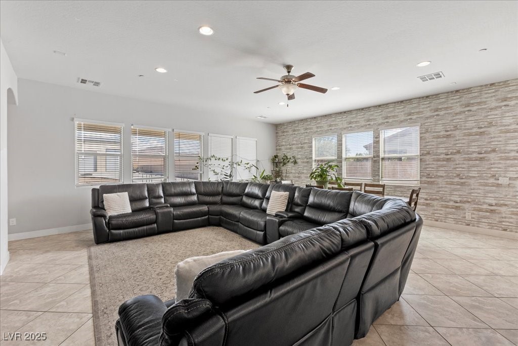 259 Milan Street Henderson, NV 89015 - Photo 19 of 99 Living room featuring light tile patterned floors, recessed lighting, and a ceiling fan