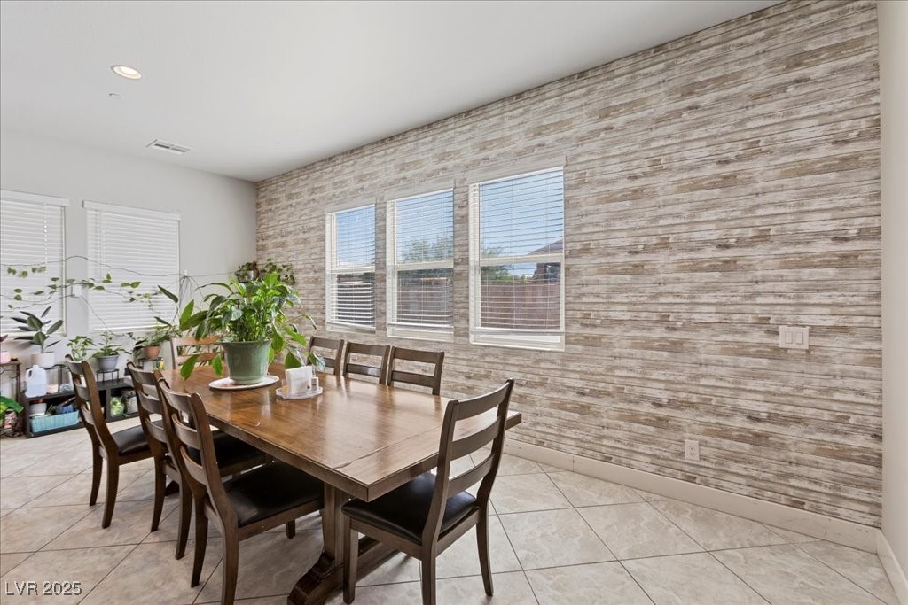 259 Milan Street Henderson, NV 89015 - Photo 25 of 99 Dining space with light tile patterned floors and recessed lighting