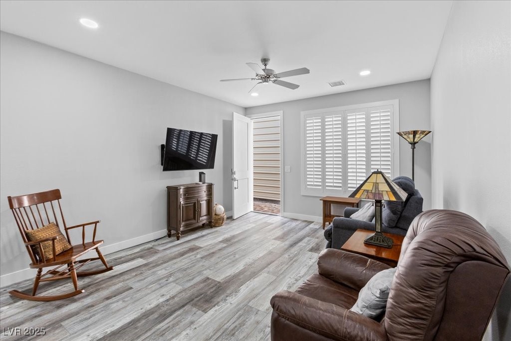 259 Milan Street Henderson, NV 89015 - Photo 58 of 99 Guest house living area with recessed lighting, wood finished floors, and ceiling fan