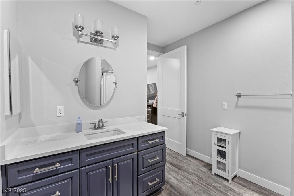 259 Milan Street Henderson, NV 89015 - Photo 71 of 99 Guest house bathroom featuring vanity and dark wood finished floors