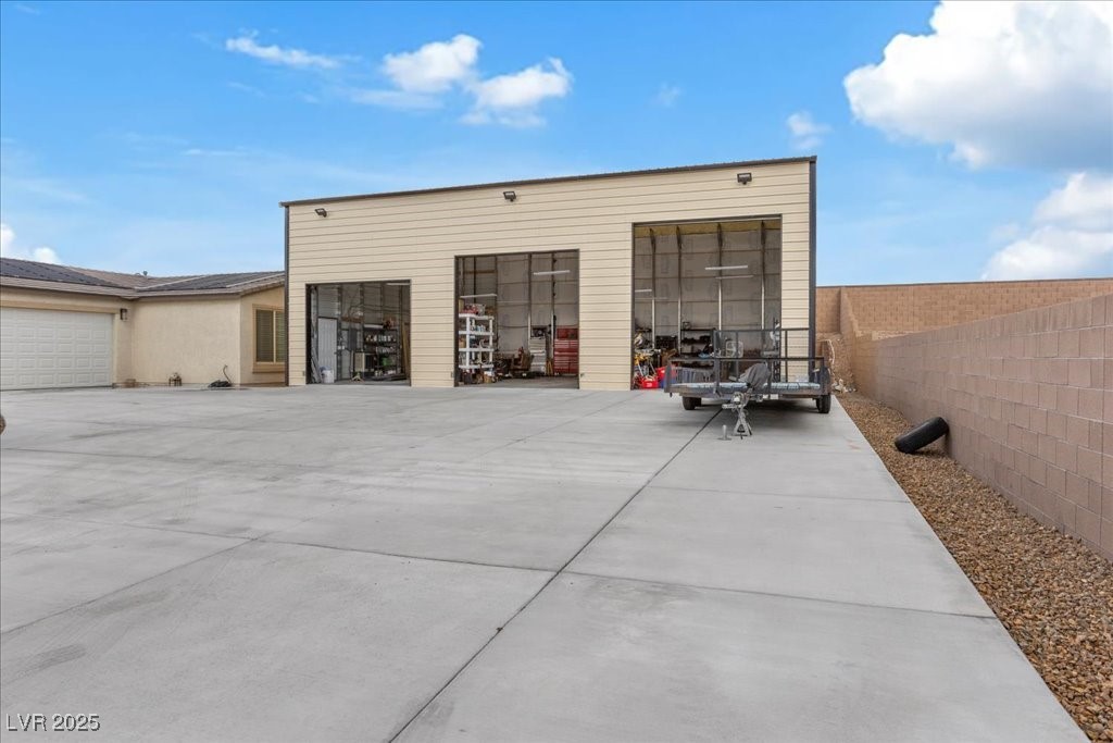 259 Milan Street Henderson, NV 89015 - Photo 77 of 99 Workshop with automatic 10', 12', and 14' garage doors