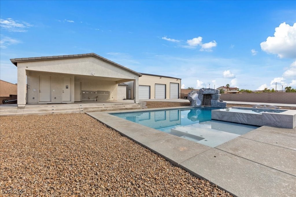 259 Milan Street Henderson, NV 89015 - Photo 88 of 99 View of pool with a patio area and a pool with connected hot tub