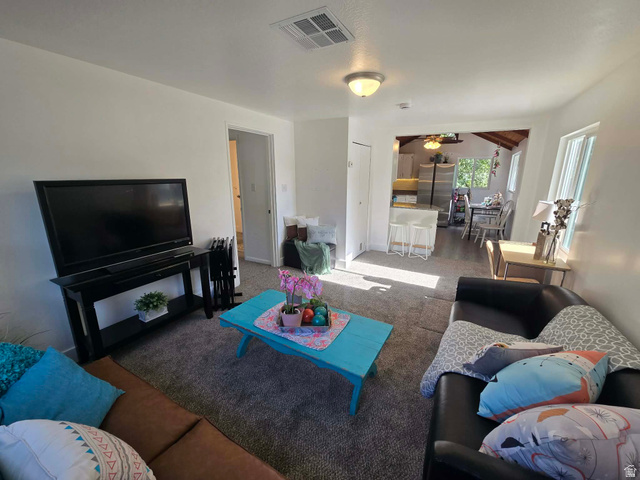 259 14th Street Ogden, UT 84404 - Photo 7 of 21 Carpeted living area with white painted walls