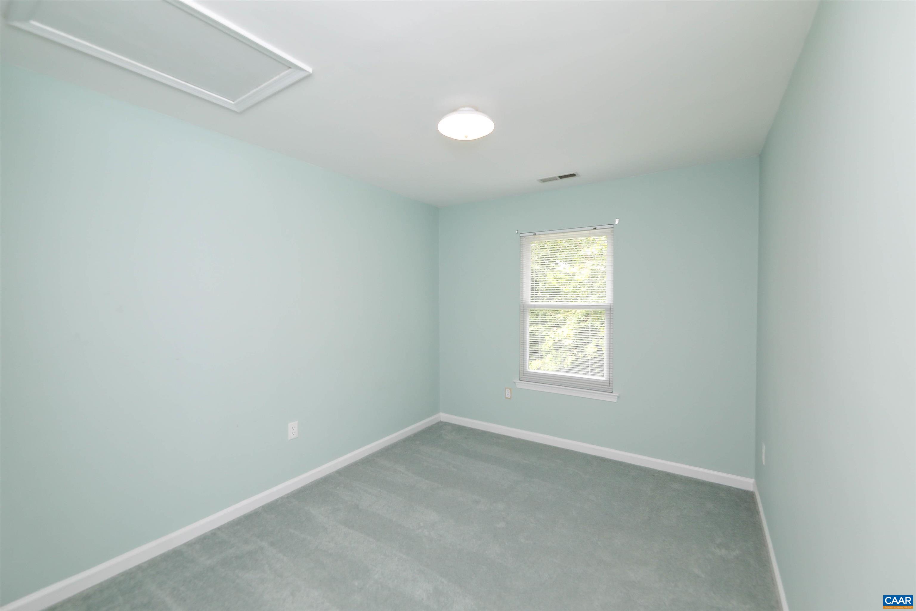 Undisclosed Address Charlottesville, VA 22902 - Photo 24 of 49 an empty room with windows and mirror