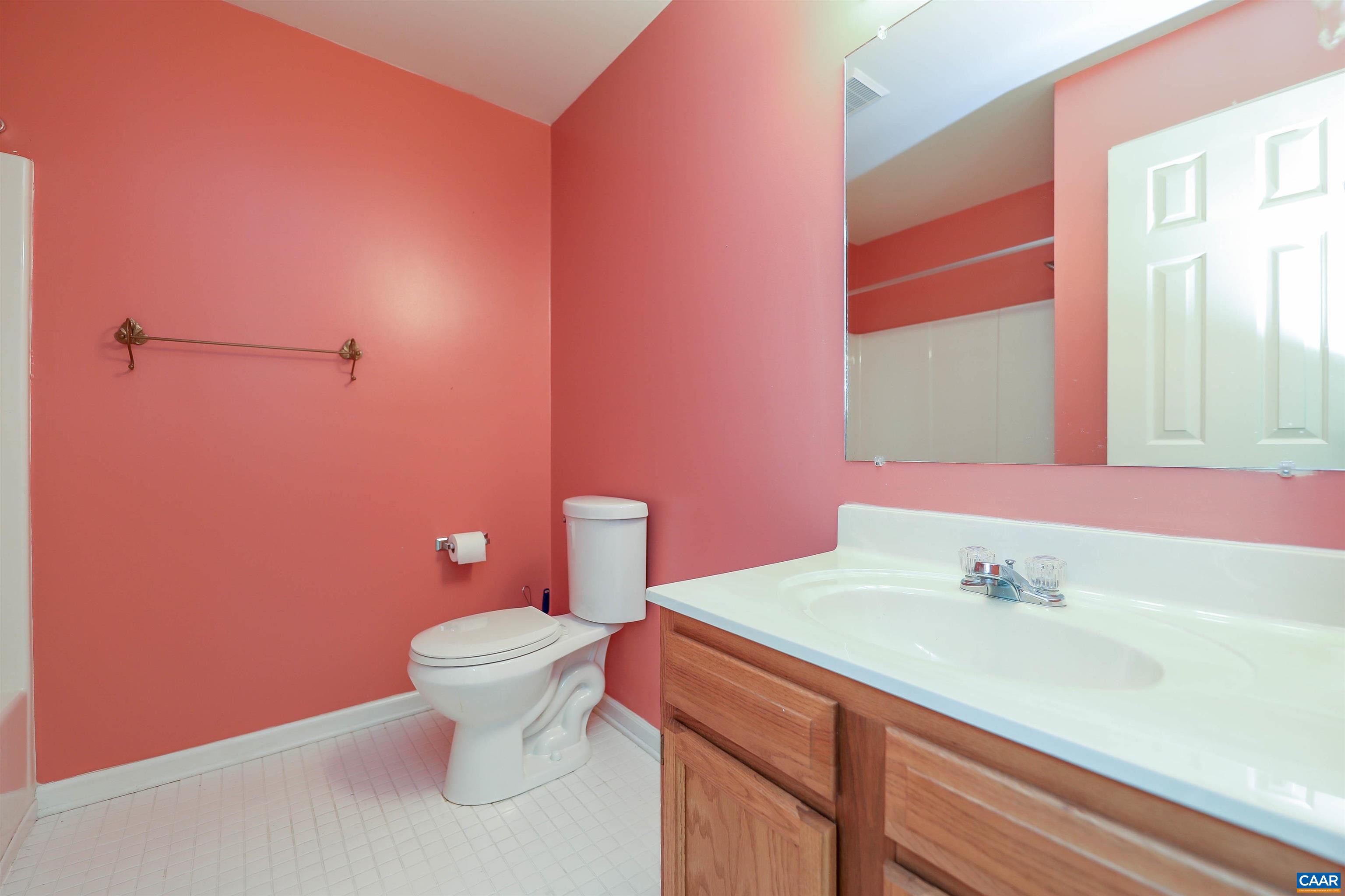 Undisclosed Address Charlottesville, VA 22902 - Photo 25 of 49 a bathroom with a sink vanity mirror and toilet
