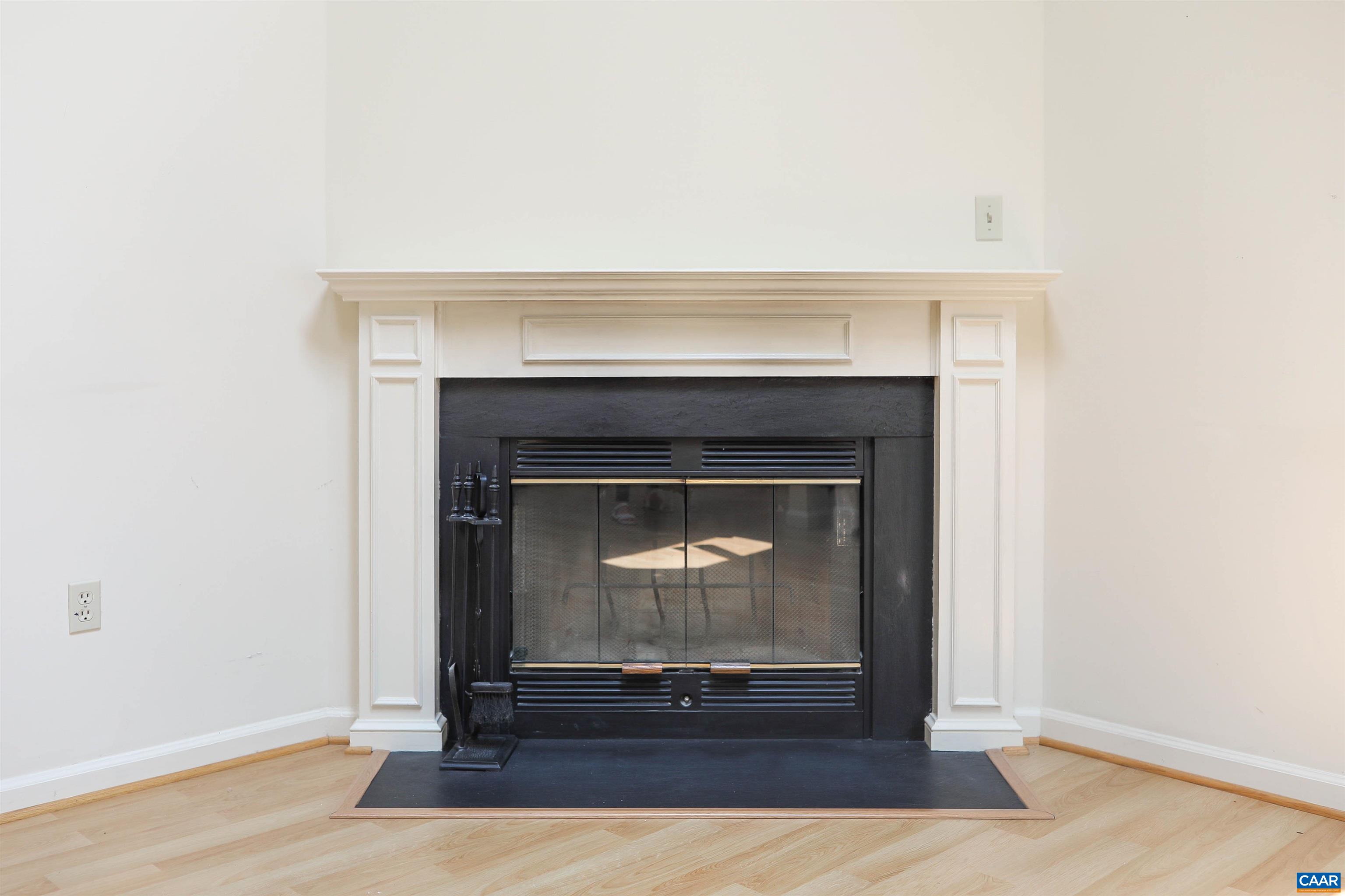 Undisclosed Address Charlottesville, VA 22902 - Photo 8 of 49 a living room with a fireplace