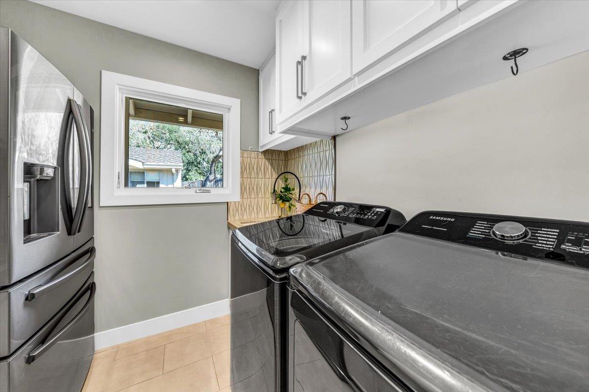 66 Rancho Road Carmel Valley, CA 93924 - Photo 14 of 59 a view of a room with stainless steel appliances window and a refrigerator