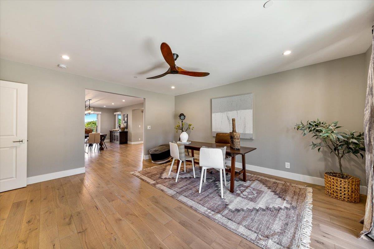 66 Rancho Road Carmel Valley, CA 93924 - Photo 16 of 59 a view of a dining room with furniture and wooden floor