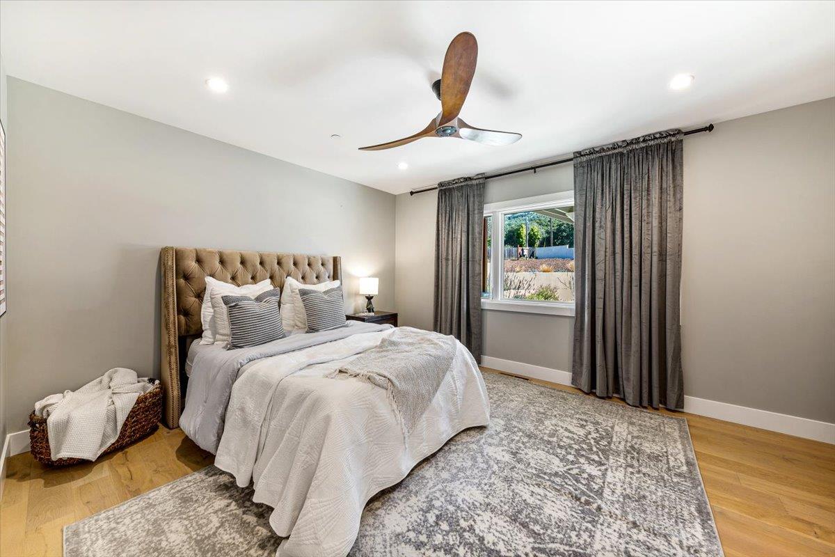 66 Rancho Road Carmel Valley, CA 93924 - Photo 18 of 59 a bedroom with a bed and a window
