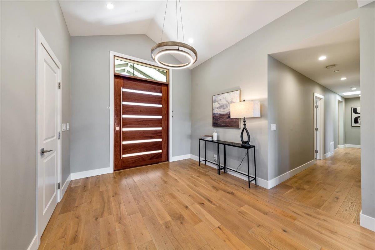 66 Rancho Road Carmel Valley, CA 93924 - Photo 2 of 59 a view of a room with wooden floor