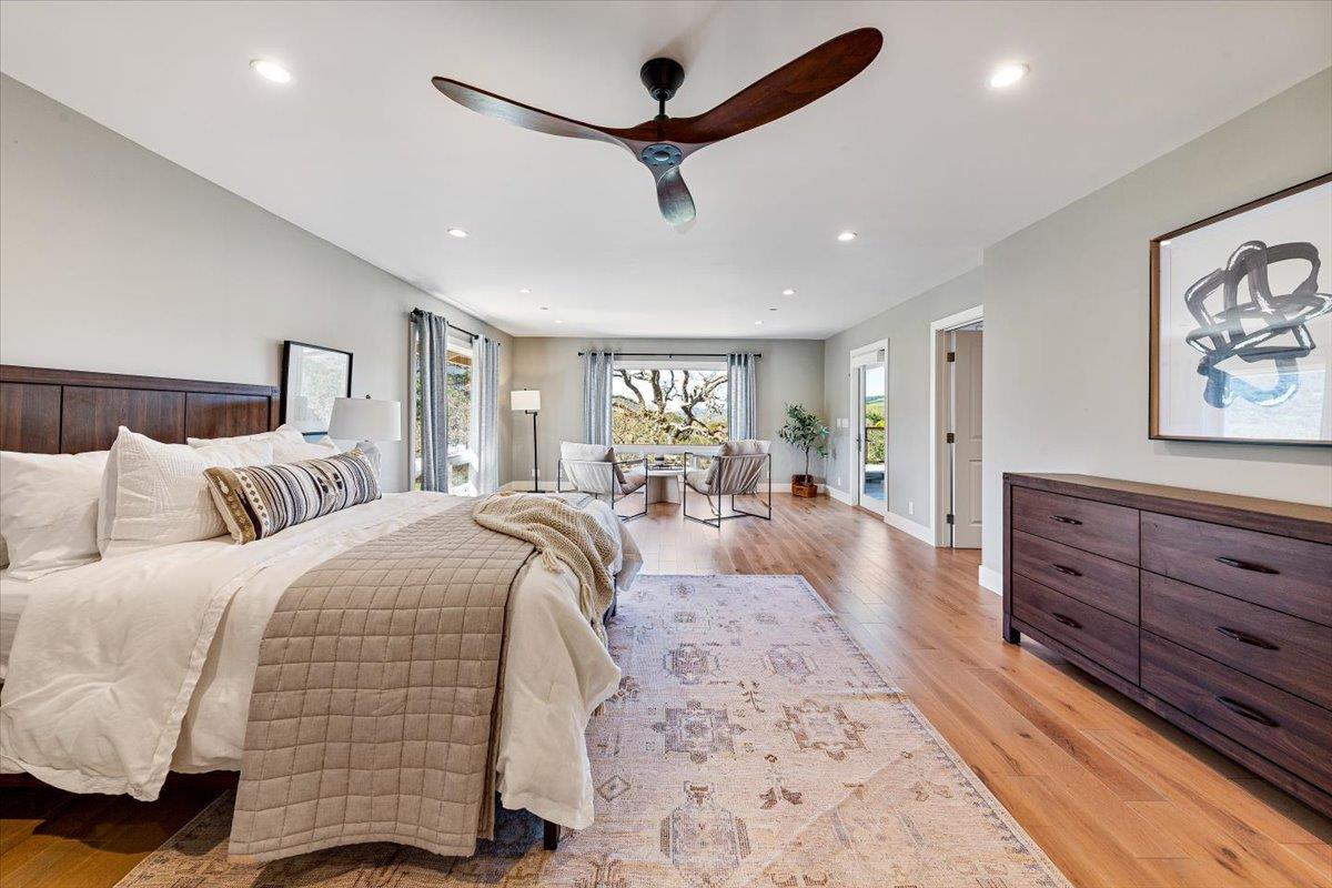 66 Rancho Road Carmel Valley, CA 93924 - Photo 23 of 59 a bed room with bed and furniture