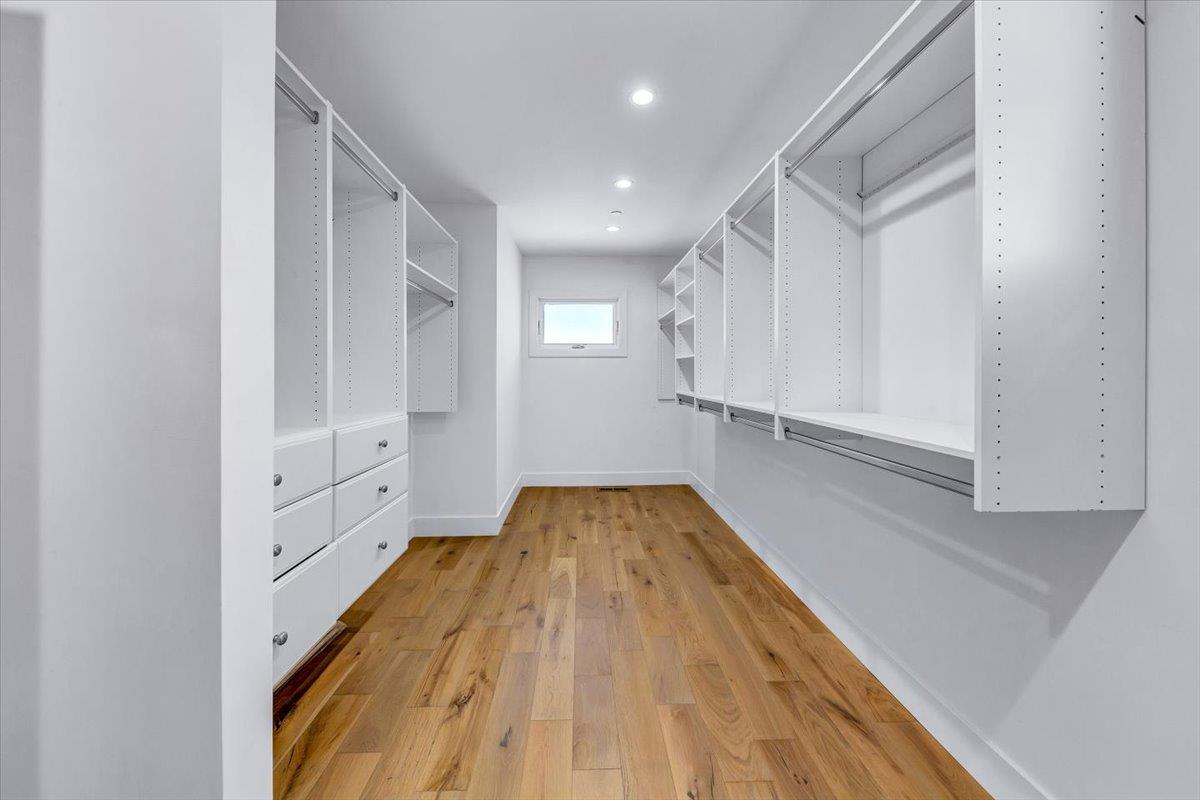 66 Rancho Road Carmel Valley, CA 93924 - Photo 32 of 59 a view of a hallway with closet and wooden floor