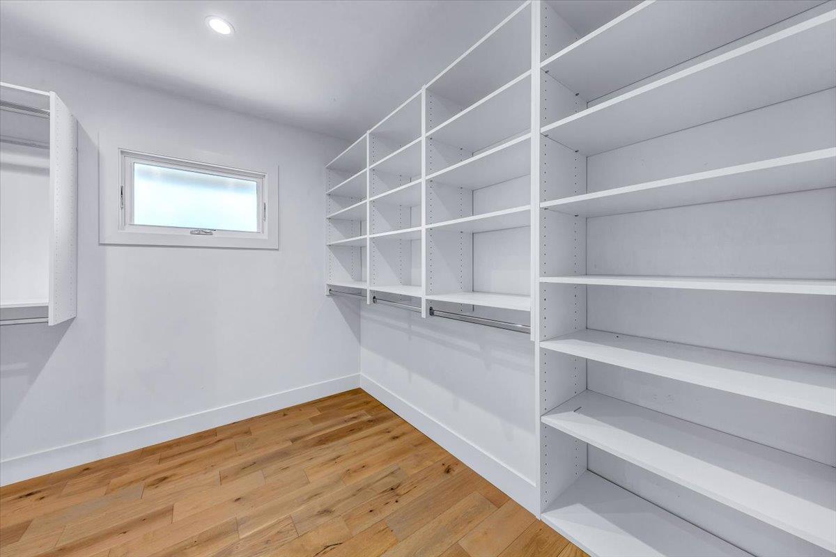 66 Rancho Road Carmel Valley, CA 93924 - Photo 33 of 59 a view of an empty room with empty racks