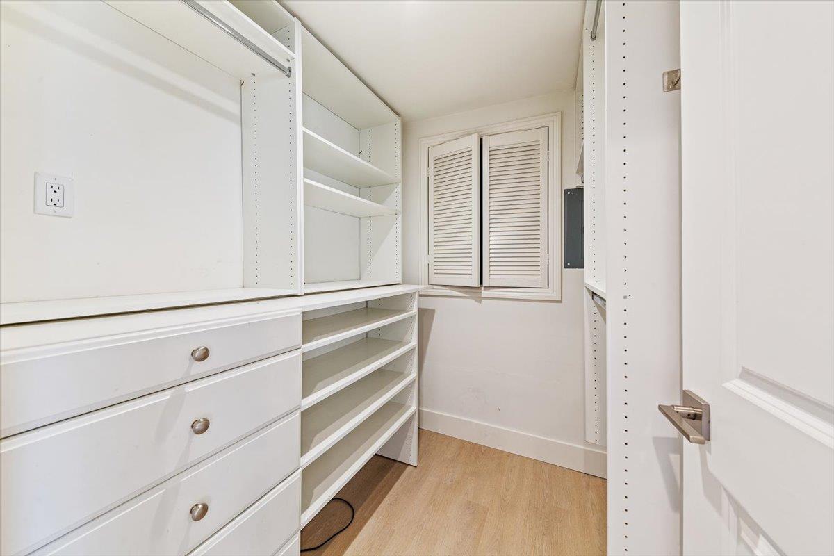66 Rancho Road Carmel Valley, CA 93924 - Photo 39 of 59 a view of walk in closet with empty racks