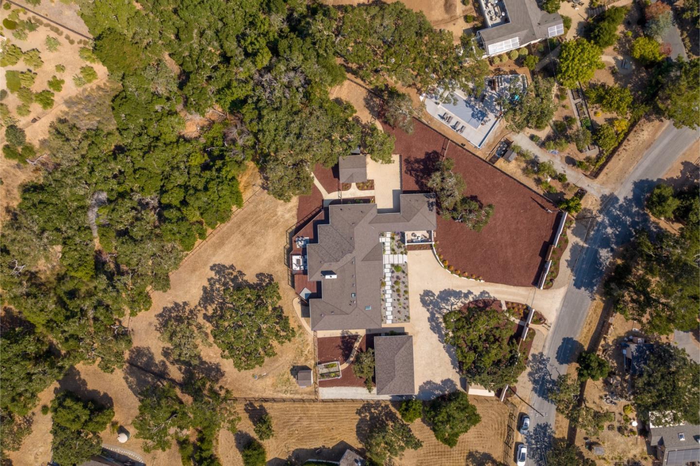 66 Rancho Road Carmel Valley, CA 93924 - Photo 55 of 59 an aerial view of residential houses with outdoor space