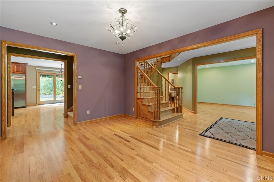 1103 Rail Fence Road Camillus, NY 13031 - Photo 15 of 50 Formal Dining Room open to the foyer and kitchen