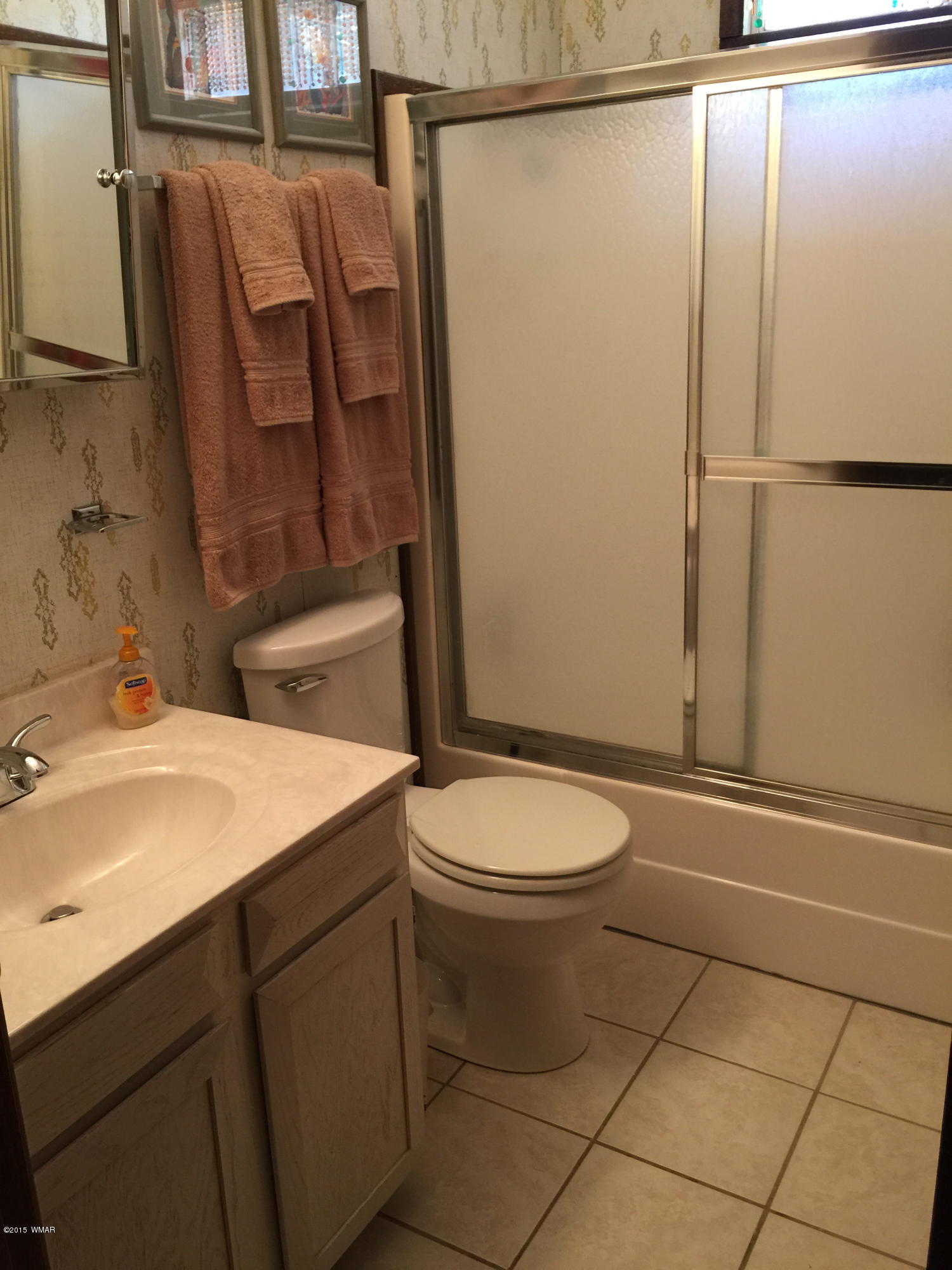 261 Powderhorn Lane Lakeside, AZ 85929 - Photo 22 of 31 a bathroom with a granite countertop sink toilet and shower