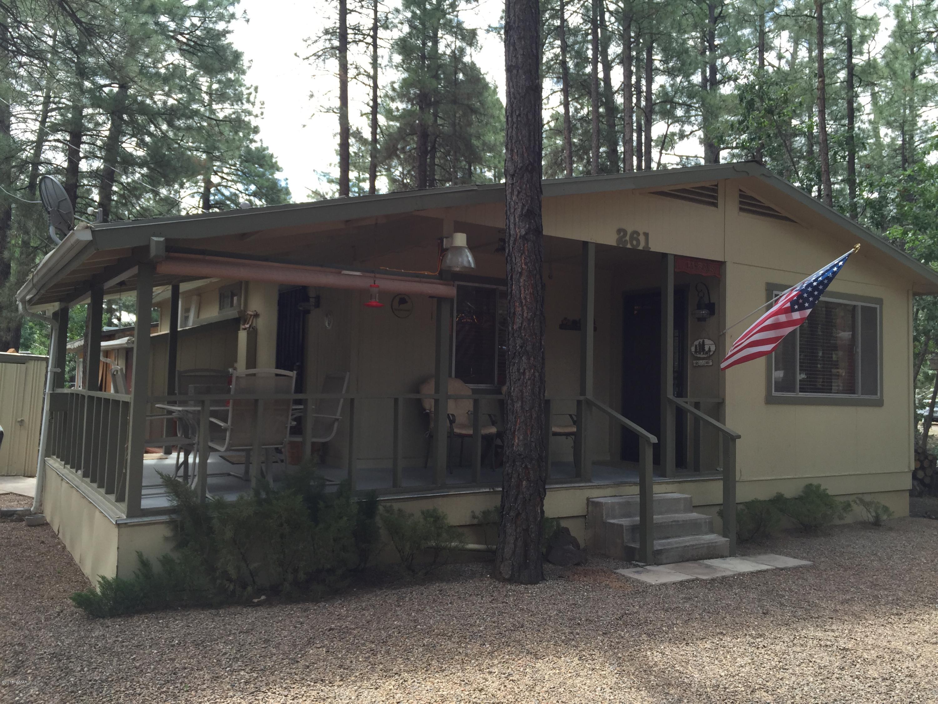261 Powderhorn Lane Lakeside, AZ 85929 - Photo 10 of 31 a view of a house with a yard