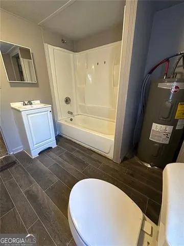 a bathroom with a sink and a toilet