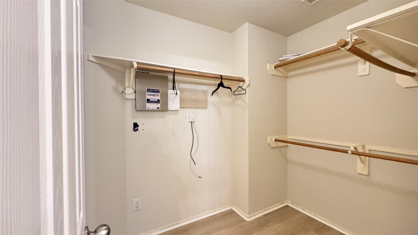 6818 Hampden Point Court Houston, TX 77040 - Photo 13 of 17 a view of walk in closet