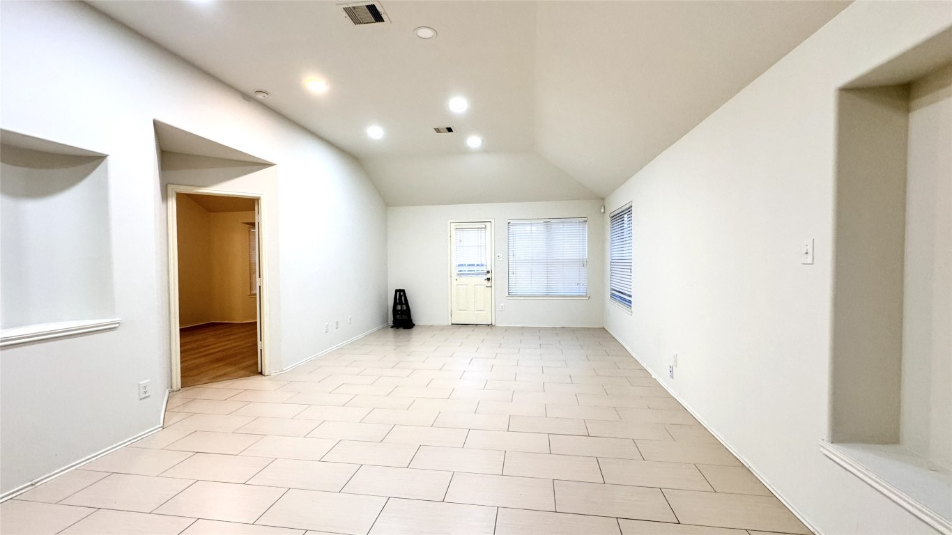 6818 Hampden Point Court Houston, TX 77040 - Photo 8 of 17 a view of an empty room and window