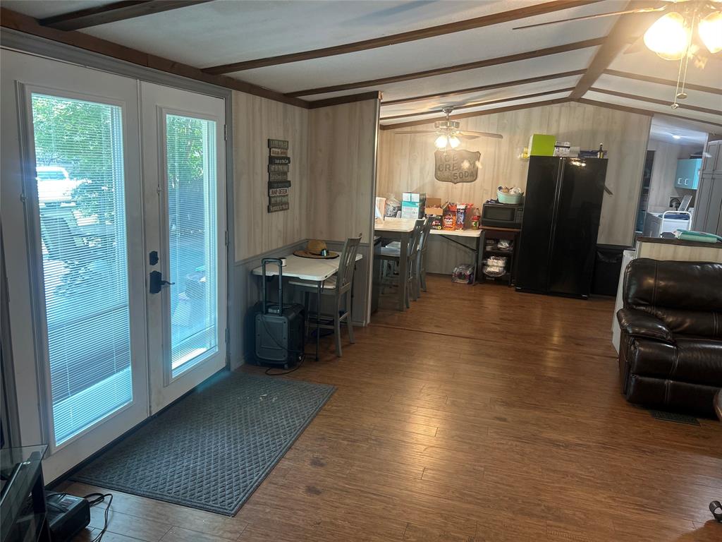 4705 Fox Hollow Road Graham, TX 76450 - Photo 25 of 28 a living room with furniture and a large window