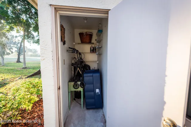 a view of a livingroom from a hallway