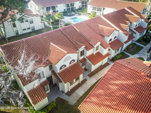 a view of balcony with wooden floor