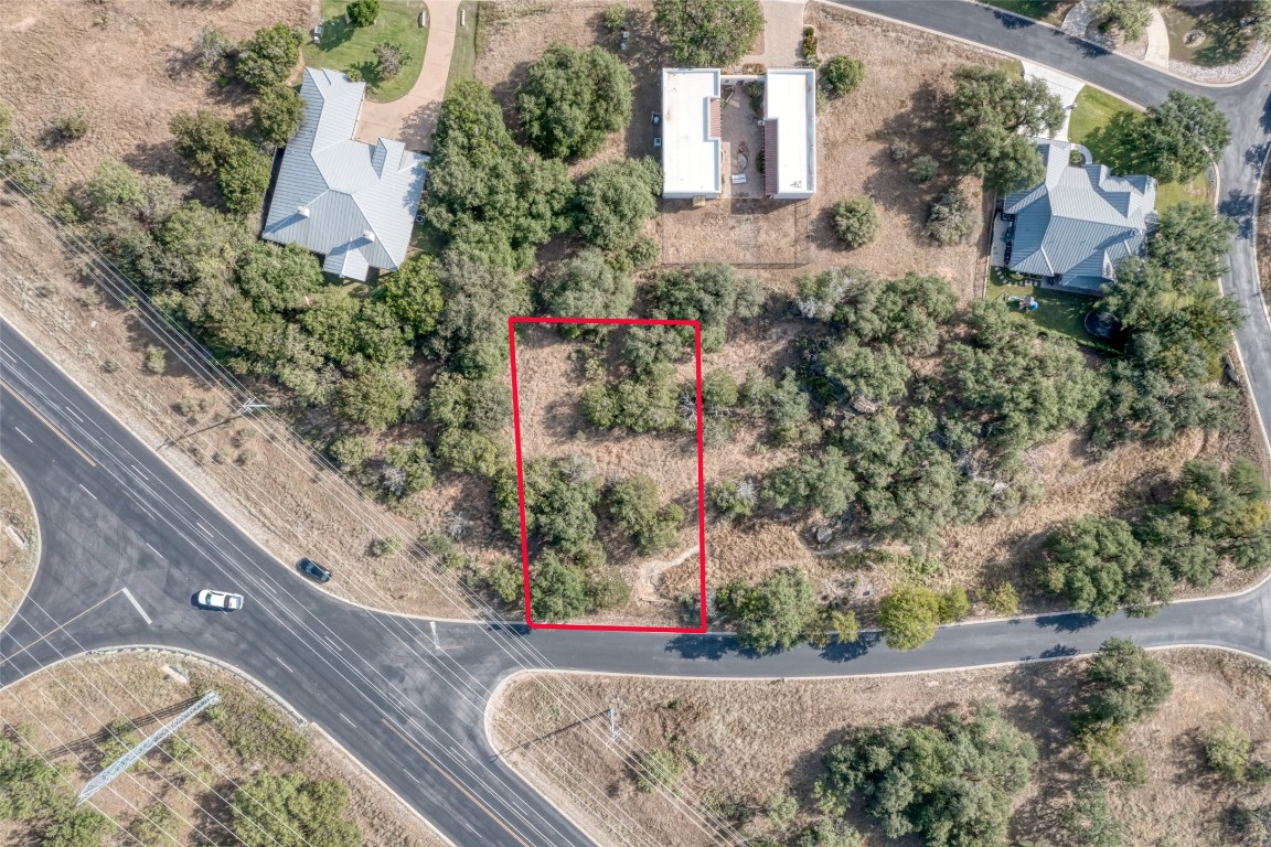 Tbd Hi Circle North Horseshoe Bay, TX 78657 - Photo 16 of 19 an aerial view of a house with a yard and garden
