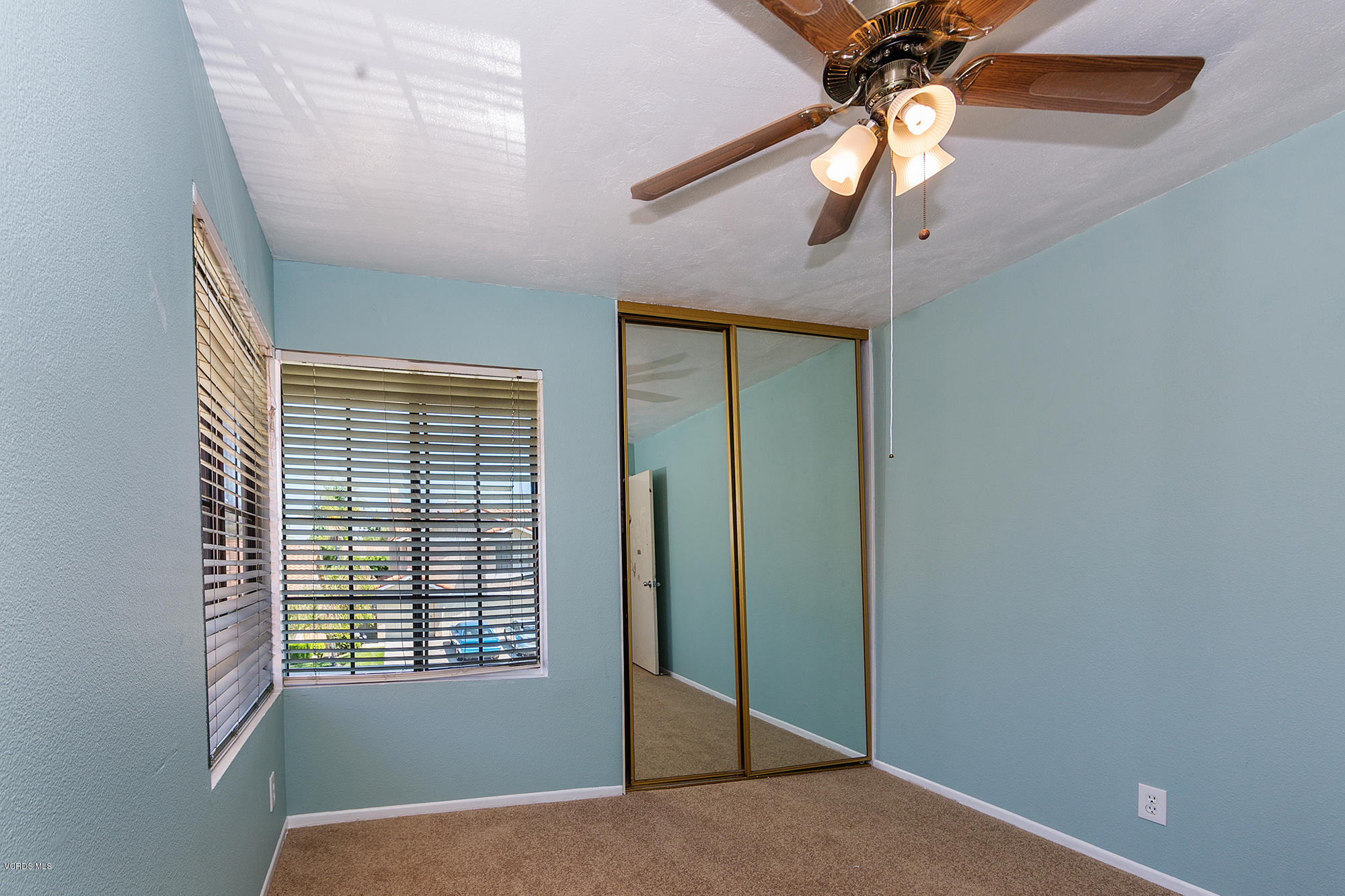 12590 Crystal Ranch Road Moorpark, CA 93021 - Photo 14 of 21 a view of an empty room with a window