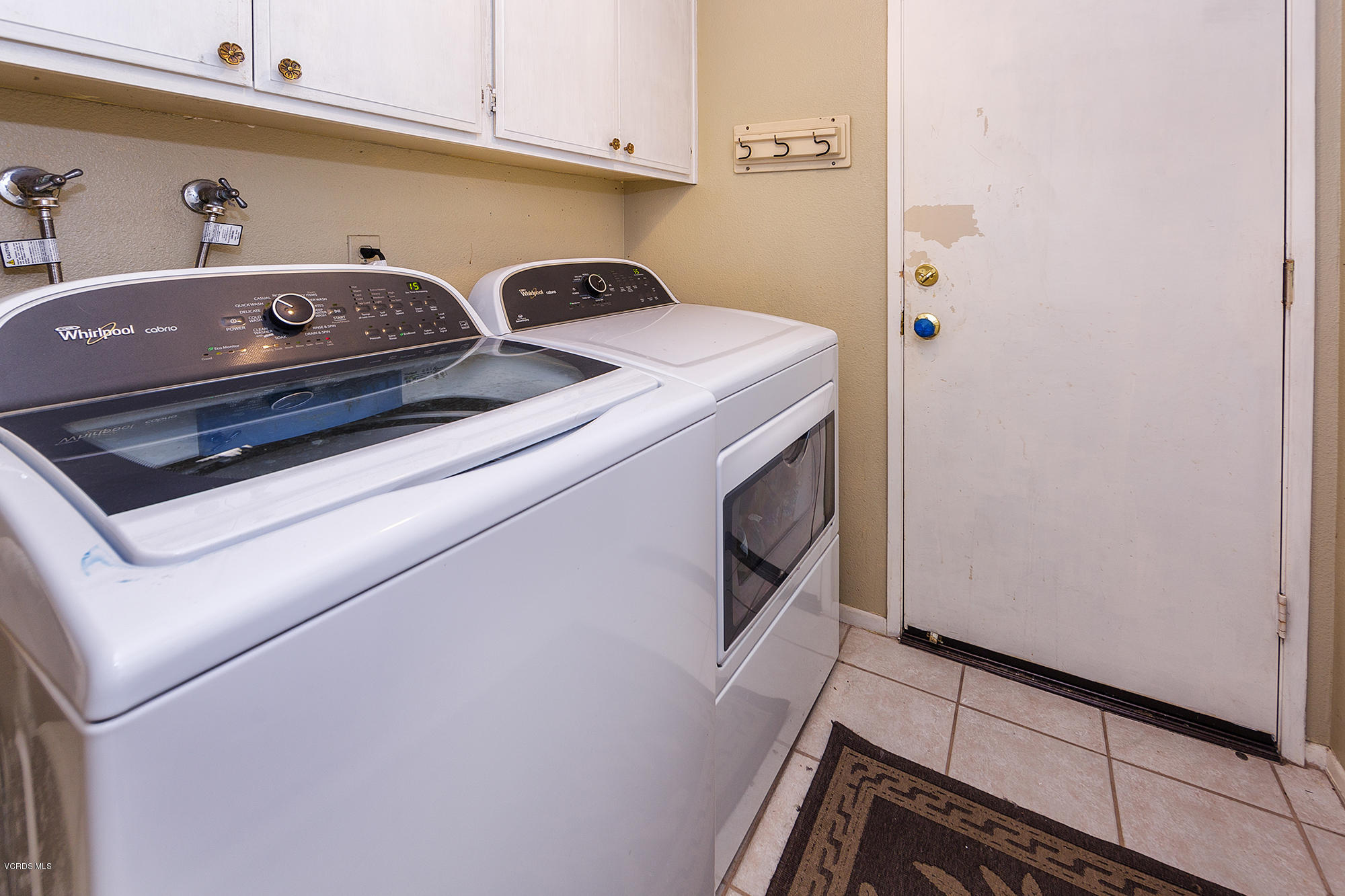 12590 Crystal Ranch Road Moorpark, CA 93021 - Photo 18 of 21 a utility room with dryer and washer