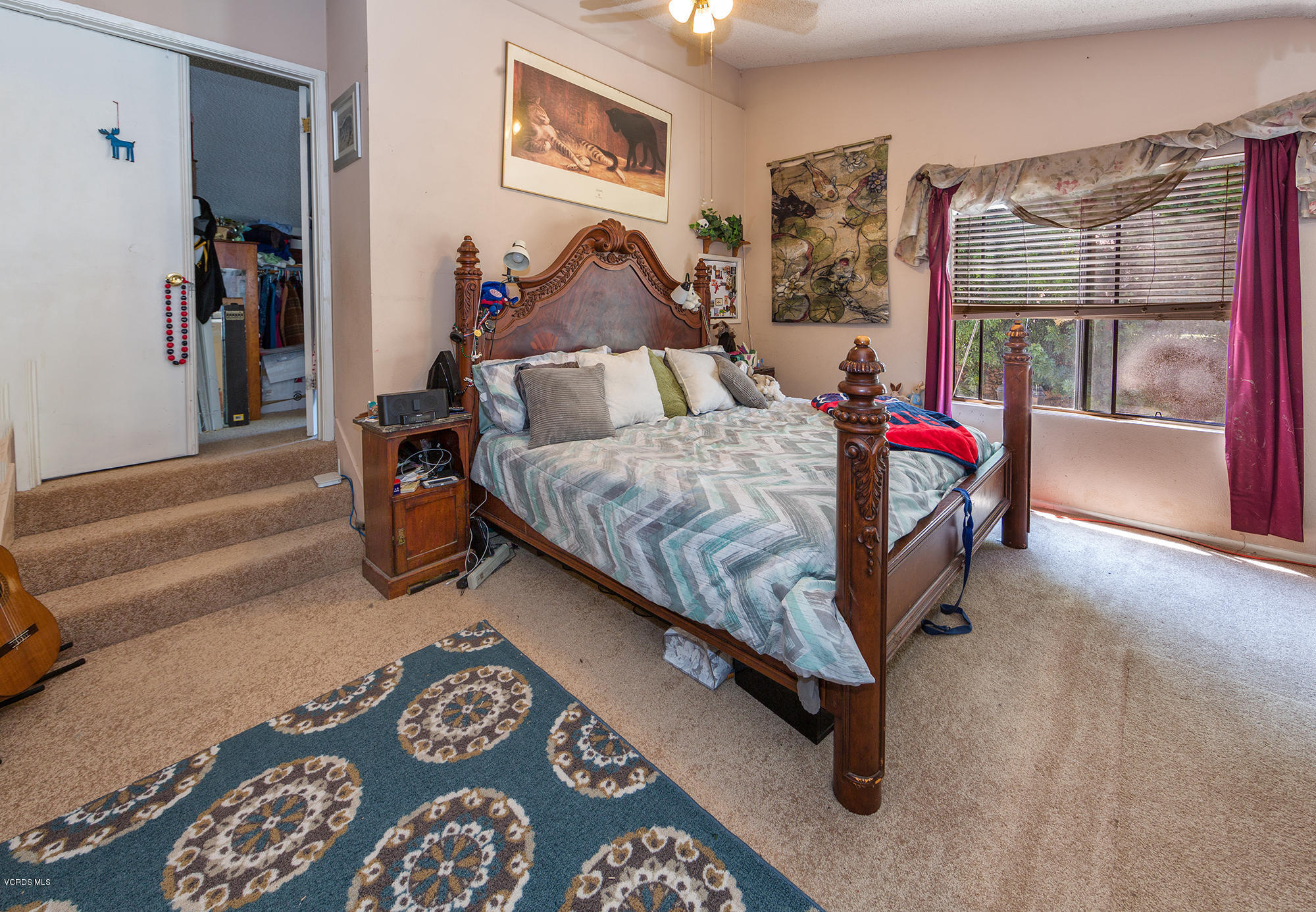 12590 Crystal Ranch Road Moorpark, CA 93021 - Photo 9 of 21 a bed room with a bed and balcony