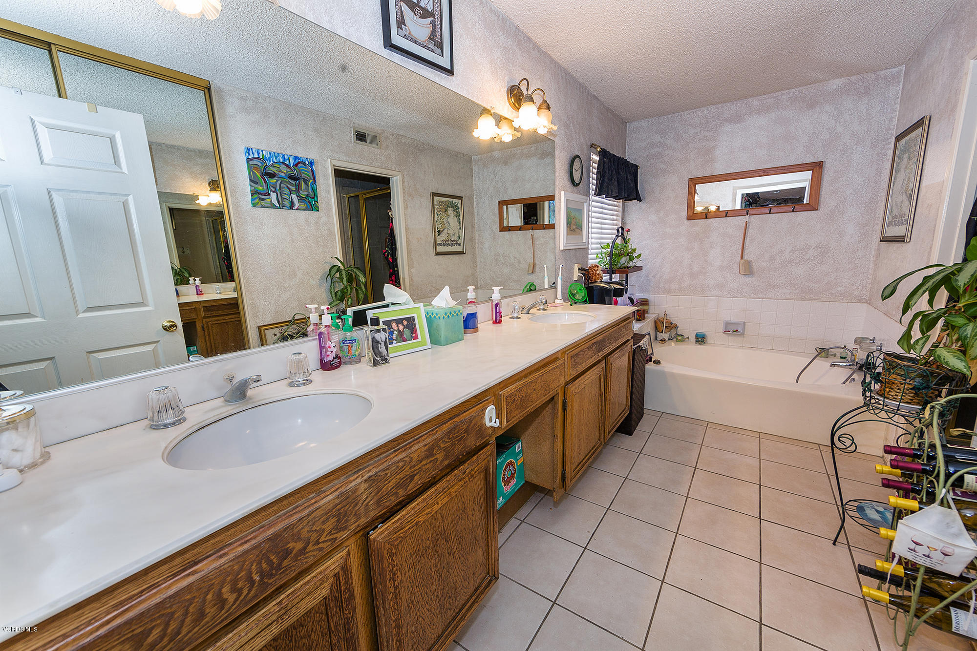 12590 Crystal Ranch Road Moorpark, CA 93021 - Photo 10 of 21 a bathroom with a sink double vanity