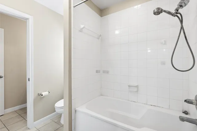 a bathroom with a bath tub and a shower