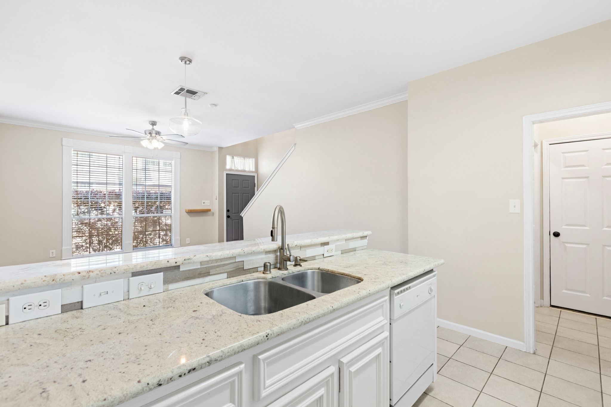 1708 Dennis Street Houston, TX 77004 - Photo 8 of 20 a view with granite countertop a sink and a window