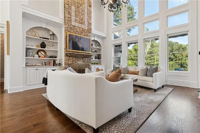 a kitchen with stainless steel appliances granite countertop a stove and a refrigerator